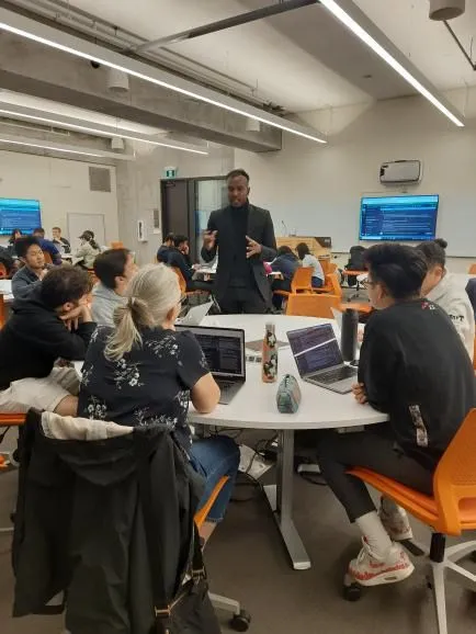 Karan Balaji speaking at the University of Toronto